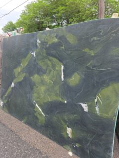 Avocatus Leather Quartzite:  bold organic movement that feels right at home in outdoor kitchen and BBQ designs. Its deep green tones and dramatic pattern make a statement anywhere.
 Visit our Philly slab yard @angelosmarblephila to view this and many other beautiful stones in stock. 
#avocatusquartzite #leatheredquartzite #greencountertops 
#stonedesigner #stonefabrication